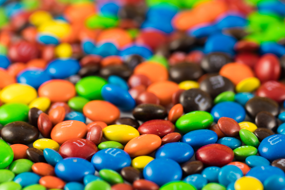 How do they get perfect M’s printed on the “M&M’s” products?